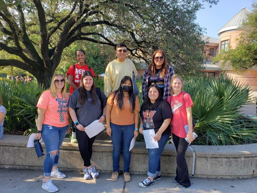 Spartan Oracle, yearbook students spend time with zoo animals while learning photo and layout techniques
